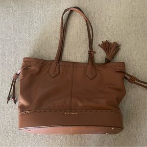 Cole Haan tote purse in Tan with navy blue lining